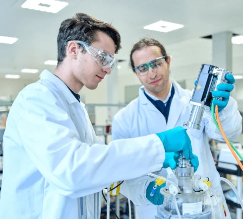 Picture of two UCB employees working in a laboratory